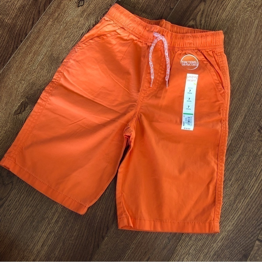 Jumping Beans orange shorts in size 7